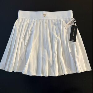 ARITZIA x TNA GOLDEN BUTTER WHITE TENNIS SKIRT